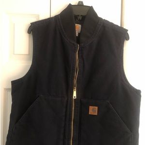 Irregular Carhartt navy blue guys vest.